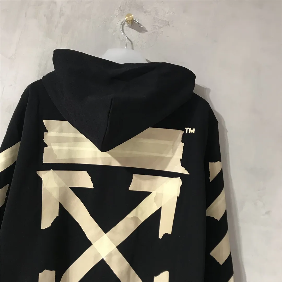 Top tested version OFF WHITE OW hot stamping tape printing male and female couples pure cotton loose same style zipper jacket hooded sweatshirt The printing is done on a Japanese-owned Mimaki printing machine, with no edges or burrs. Inkjet heat transfer is hot-pressed and cold-teared, and the high temperature is 180 degrees. The front piece needs to be pressed twice (the second time requires 180kg of air pressure). The transparent fabric is anti-scratch and ironing, and the printing is fog-free. The semi-transparent tape in the front circle can reveal the part of the printing underneath. The golden printing color of the tape is not The flat color and tape printing overlap have different color depths. The wash label is also customized according to the original font. The accessories still use the full line of correct accessories. The rectangular woven collar label design is cancelled. The previous three-dimensional silicone feel font is changed to a fully woven collar label. Fluorescent fonts can be seen on the collar label. The five-link silicone hangtag, three-link washable label and zebra crossing packaging line are still the same. 480g pure cotton terry fabric, a major launch with full drape. A full set of customized accessories, one-to-one mold opening, professional ow. Size: XS-L Size chart